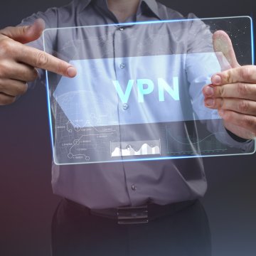 vpn services comparison tunnelbear expressvpn man showing vpn sign on display 